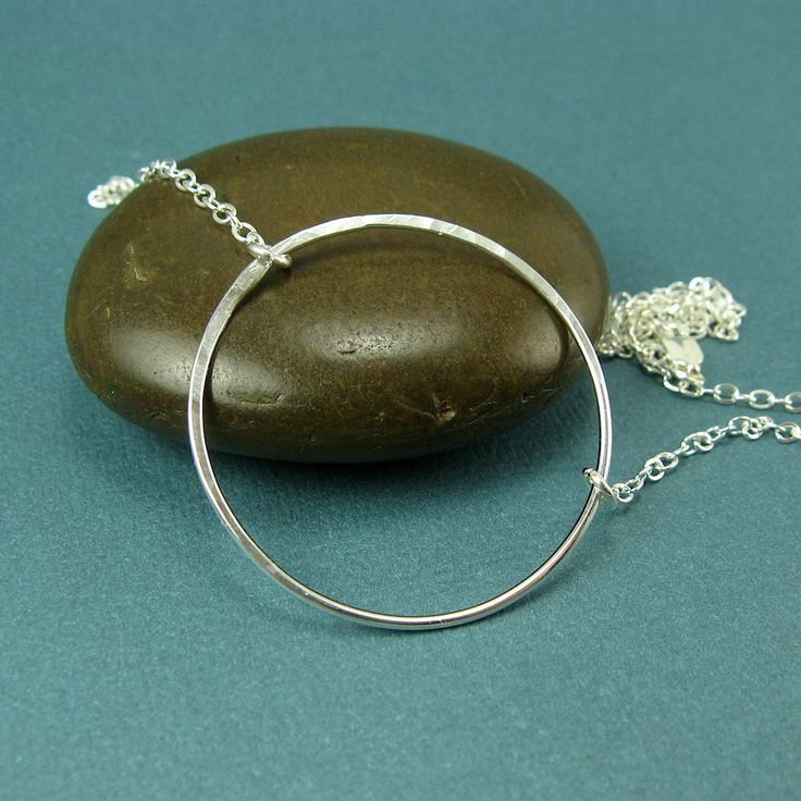 "FREE SHIPPING with a purchase of $35 or more!  Automatically deducted at checkout. sterling silver hammered circle necklace. layering necklace. modern necklace. For those days that you just need to wear something subtle and simple.  The circle necklace reflects a quiet beauty.  Looks lovely solo or layered. -Sterling silver -The circle measures about 1-1/2\" across (about 4cm). -Available in 16, 18, 20, and 24 inches. Want to save 20% Right Now and always be in the loop with exclusive sales and Double Circle Necklace, Necklaces Layered, Silver Dragonfly Necklace, Delicate Silver Necklace, Hammered Jewelry, Modern Necklace, Bar Pendant Necklace, Necklace Layering, Sterling Silver Chain Necklace