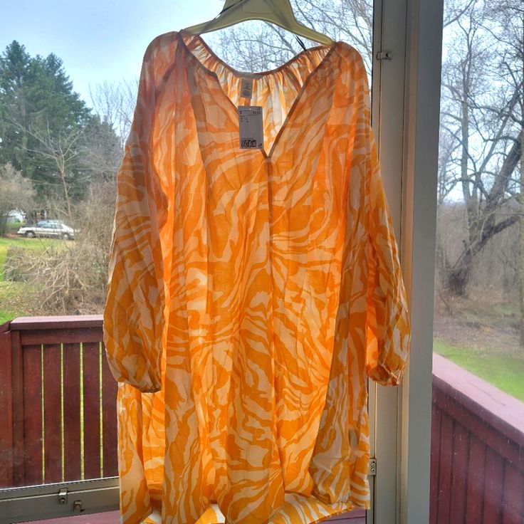 Vibrant Yellow Smock/Cover-Up Dress. Round Neck Puffy Sleeves 3 Quarters Length. Dress Falls At Knee. Slight Sheer But Not At All See-Through. Size:Xxl Dress Is Brand New With Tags Attached. Yellow Spring Tunic For Beach, Spring Yellow Tunic For Beach, Yellow Long Sleeve Tunic For Spring, Spring Yellow Beach Tunic, Yellow Long Sleeve Tops For Beach Season, Yellow Spring Beach Tunic, H&m Blouse For Spring Vacation, Flowy Orange Blouse For Vacation, Long Sleeve Orange Tunic For Summer