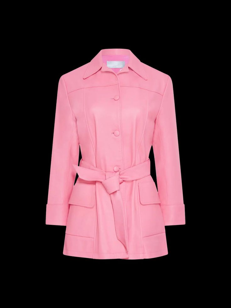 Constructed from supple pink leather, the Somerset trench is your quintessential statement outerwear. Complete with self-covered buttons and a belt that nips you in at the waist. The inside consists of a soft pink-to-red ombré lining, for a pop of color when worn open. The Short Trench silhouette is made to fit relaxed and tie tightly, so it can be easily layered over any outfit while retaining its flattering shape. Luxury Pink Notch Lapel Outerwear, Luxury Pink Outerwear With Notch Lapel, Designer Single Breasted Pink Blazer, Luxury Pink Blazer With Lapel Collar, Luxury Pink Single Breasted Outerwear, Designer Pink Winter Blazer, Luxury Pink Single-breasted Outerwear, Designer Pink Blazer For Workwear, Designer Formal Pink Outerwear