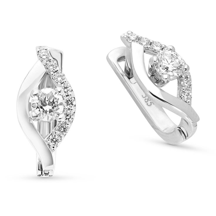 Celebrate your changing, growing and evolving romance with these exceptional diamond flame huggie. Expertly crafted in 18K white gold, each earring features a unique cascading drop outlined with polished and shimmering diamonds. Anchoring each earring, a single round diamond glistens in a unique setting that moves with every beat of her heart and every turn of her head. 
0.52 carat center round cut diamonds
0.26 carat diamond pave setting
18k white gold
The earring design can be c Modern Round Cut Halo Diamond Earrings, Modern White Gold Diamond Earrings Round Cut, Modern White Gold Round Cut Diamond Earrings, Fine Jewelry Diamond Huggie Earrings With Single Cut Diamonds, Modern Small Hoop Diamond Earrings In Cubic Zirconia, Modern Diamond White Cubic Zirconia Hoop Earrings, Modern Cubic Zirconia Hoop Earrings In Diamond White, White Hoop Diamond Earrings With Single Cut, Modern Round Cut Huggie Earrings For Formal Events