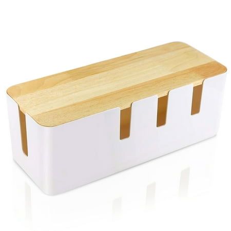 a wooden cutting board sitting on top of a white container with two compartments for utensils