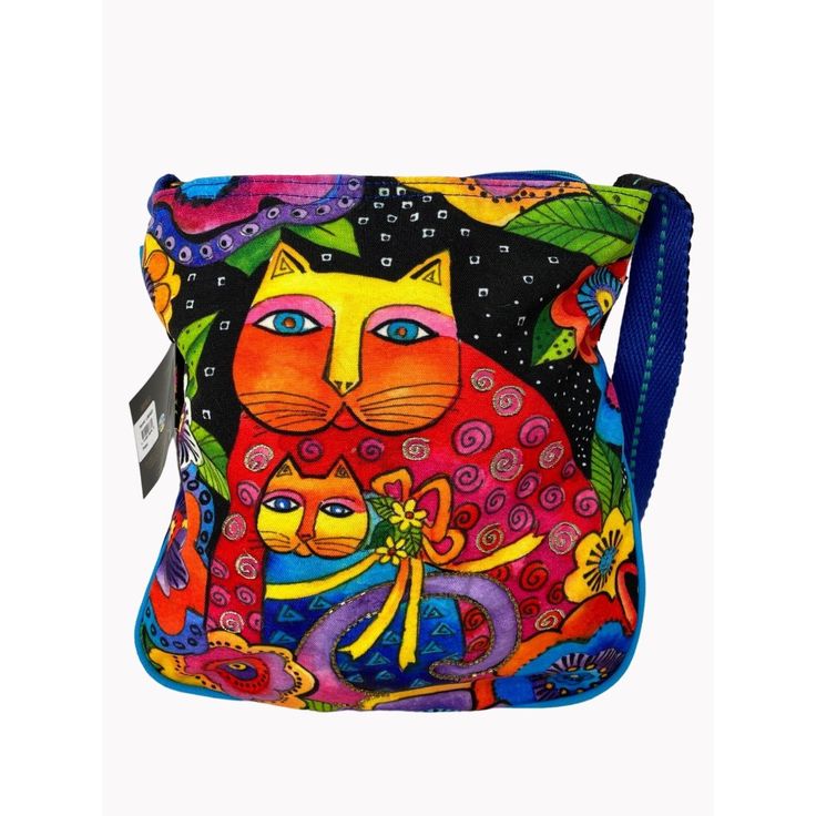 This Laurel Burch Crossbody Bag Showcases The Vibrant "Mother Daughter In Flowers" Artwork. This Multi-Colored Canvas Bag Features Bright Abstract Art, Beading, And Comes With An Original Tassel. Brand: Laurel Burch Color: Multi-Colored Style: Bright Abstract Art Adjustable Strap Beading On Front 10 Inches Wide Zippered Pocket On Back And Inside Comes With Original Tassel Features: Bright Colored Abstract Art, Adjustable Strap, Beading On Front, 10 Inches Wide, Zippered Pocket On Back And On Ins Artistic Hand Painted Crossbody Shoulder Bag, Reversible Multicolor Shoulder Bag As Gift, Hand Painted Multicolor Shoulder Bag For Everyday Use, Artistic Blue Tote Shoulder Bag, Multicolor Hand Painted Bags For Daily Use, Multicolor Hand Painted Shoulder Bag For Daily Use, Artistic Multicolor Bag With Adjustable Strap, Artistic Multicolor Bags With Adjustable Strap, Daily Use Multicolor Hand Painted Bags