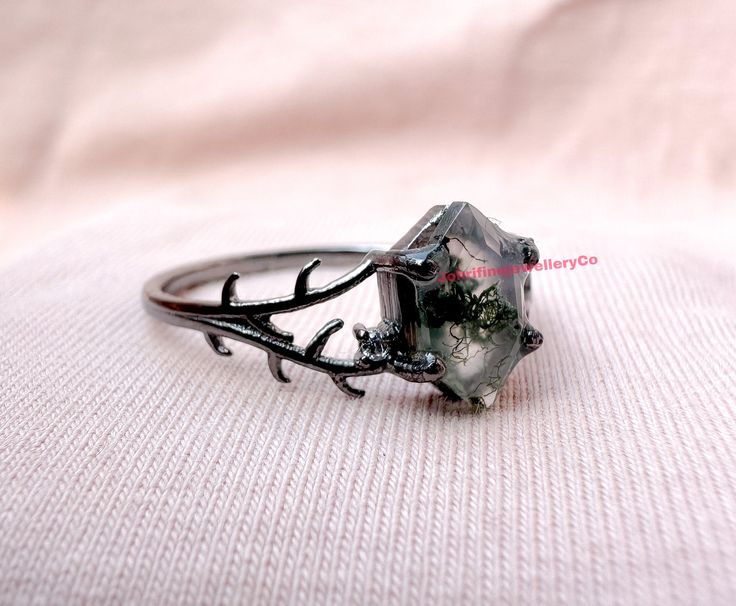 "Natural Moss Agate Ring Vintage Hexagon Engagement Ring Inspired Leaf Solitaire Ring Green Healing Gemstone Ring Unique Promise Ring Women ❥ Stone - Natural Moss Agate  ❥ Stone Size - 6x10mm ❥ Cut Type - Long Hexagon  ❥ Accent Stones - Simulated Diamond Cz  ❥ Ring Size: I offer more than one (Contact us if your ring size is not available in the listing) ❥ Color: Silver, Gold, Rose Gold, White Gold or Black Rhodium ❥ Material : 925 Sterling Silver, 14K/18K/22K Solid Gold ---> ❥ Makes a Wonderful Gift for your Girlfriend, Wife, Mother and Friend or Simply an Excellent Addition to Your Jewelry Collection -->IF YOU WANT CUSTOM ENGRAVING ON YOUR RING VISIT OUR LISTING HERE: It's Only 2 USD https://www.etsy.com/listing/1436332485/custom-engaraving - -Here's a link to my HOMEPAGE: Johrifinejewel Gemstone Rings Unique, Agate Rings, Hexagon Engagement Ring, Ring Hexagon, Moss Agate Jewelry, Unique Promise Rings, Hexagonal Ring, Unique Engagement Ring Settings, Vintage Engagement Rings Unique