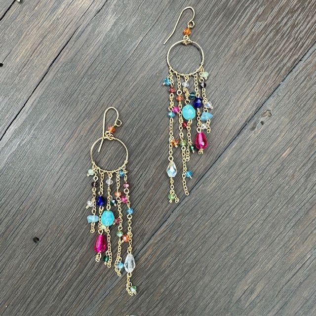 Intricate and elegant with vibrant tones and lots of movement, these fun dangle earrings with various shapes in beading, hand wire-wrapped and very lightweight. Approximately 3.5" Length Surgical steel dipped ear wires Earrings 2024, Dream Catcher Earrings, Diy Jewlery, Wrapped Earrings, Halo Earrings Studs, Wire Work Jewelry, Work Jewelry, Sell Gold, Wire Wrapped Earrings