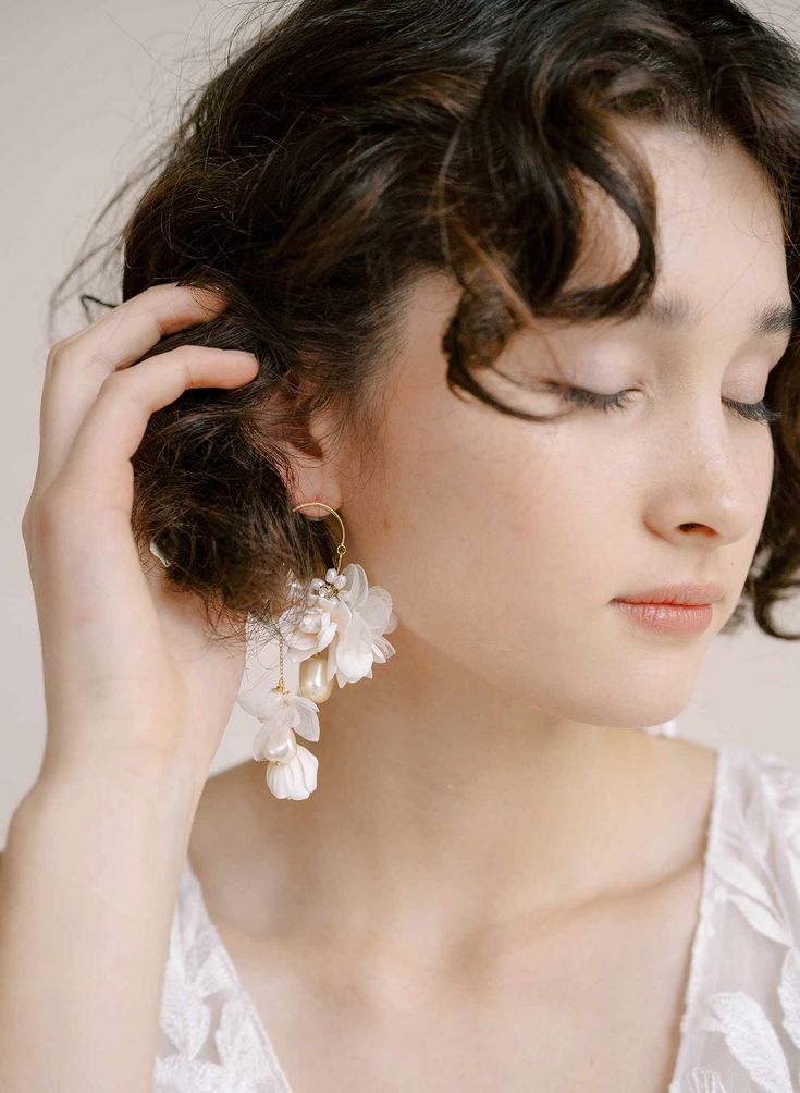 Cascading blossom, silk and pearl earring - Style #2305 Cream Pearl Drop Jewelry, Feminine White Pearl Earrings For Evening, White Feminine Pearl Earrings, Feminine Pearl White Earrings, Feminine Pearl White Bridal Earrings, Chic Flower Earrings For Weddings, Elegant Dangle Pearl Earrings With Flower Charm, Handmade Flower Earrings For Formal Occasions, Chic White Flower Earrings For Wedding