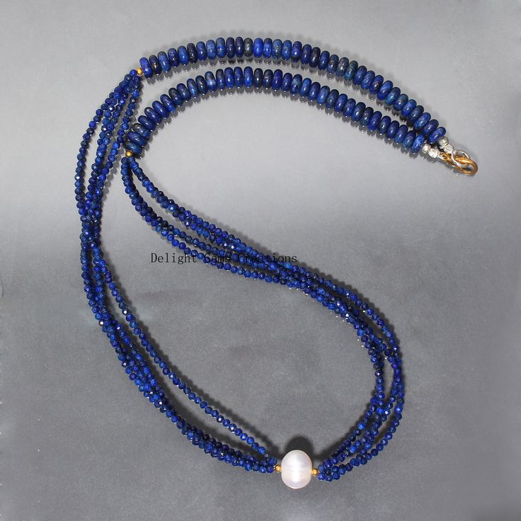 "PRODUCT DETAIL : ITEM : LAPIS LAZULI WITH PEARL BEADED NECKLACE ITEM CODE : DGC3054 ITEM NAME :NECKLACE GEMSTONE : LAPIS LAZULI WITH PEARL BEADS SHAPE : SMOOTH ROUND/RONDELLE BEADS LENGTH : 21.5\" INCH APPROX BEADS SIZE: 2.5mm/6.5mm/10.5x9mm Approx WEIGHT : 140 Cts. APPROX CUSTOMIZATION/BULK ORDER : AVAILABLE PLEASE FEEL FREE TO CONTACT IF YOU REQUIRE ANY FURTHER INFORMATION." Lapis Lazuli Gemstone Beads Pearl Necklace, Pearl Necklace With Lapis Lazuli Gemstone Beads, Halloween Beaded Jewelry, Pearl Beaded Necklace, Candy Necklaces, Lapis Lazuli Beads, Lapis Lazuli Gemstone, Gemstone Beaded Necklace, Jewellery Ideas