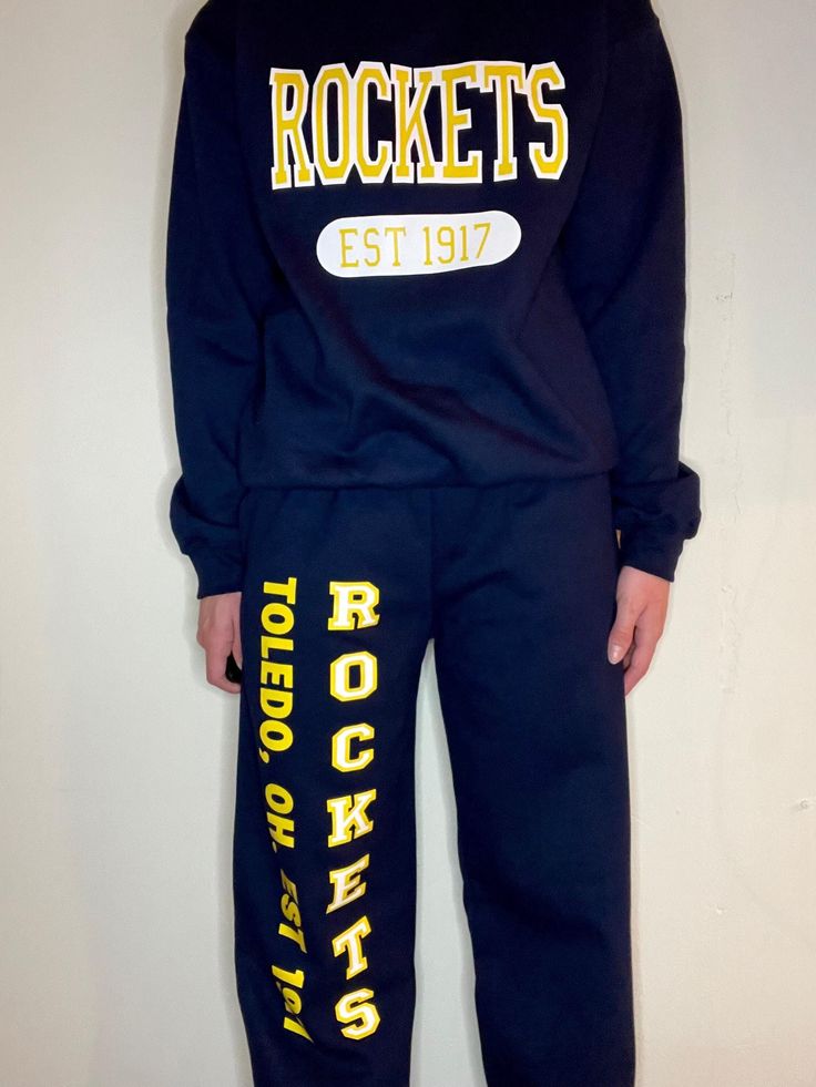 University of Toledo  Navy blue cuffed sweatpants  Navy blue crew neck Handmade items Blue Cotton Sweatpants With Ribbed Cuffs, Blue Bottoms With Letter Print For Fall, Blue Sporty Sweats With Letter Print, Casual Blue Letter Print Sweatpants, Blue Casual Joggers With Letter Print, Casual Blue Joggers With Letter Print, Casual Blue Sweatpants With Letter Print, Blue Athleisure Sweats With Letter Print, Casual Blue Sweats For Sports Season