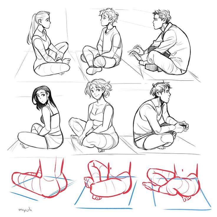 some people sitting on the ground doing different poses