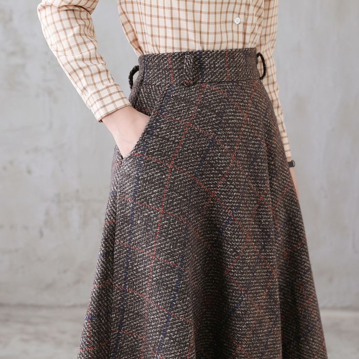 Winter Wool A-line Skirt, Winter Skirt With Pockets, Fitted Winter Skirt With Pockets, Long Wool Skirt For Workwear, Winter Flared Skirt With Pockets, Wool Long Skirt For Workwear, Winter A-line Bottoms With Pockets, Winter Wool Pleated Skirt Bottoms, Wool Pleated Skirt For Winter