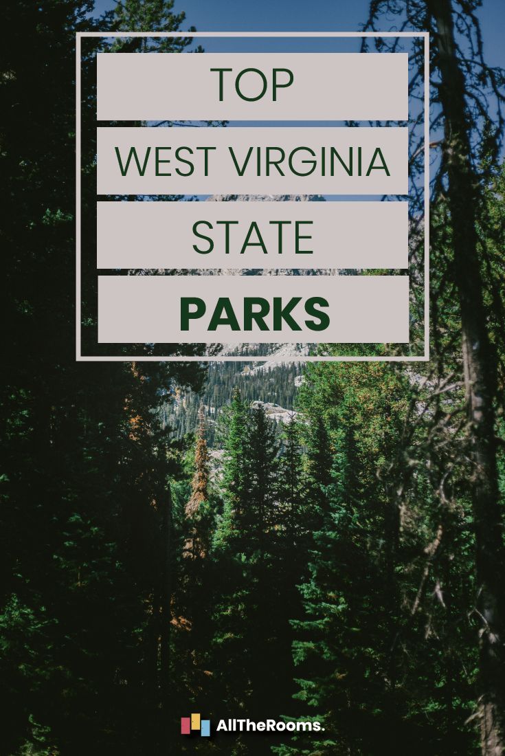 a sign that says top west virginia state parks in front of some trees and mountains