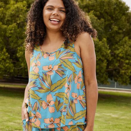 A good warm-weather top is a closet staple. This fun-loving tank embodies the trail-to-tasting room lifestyle with an active, water-friendly build and fun prints that dress up just when you need them to. Bonus: Make it a set with our Sunkissed Shorts for double the good vibes. Spring Tropical Print Tops For Loungewear, Summer Printed Tank Top For Day Out, Printed Summer Tank Top For Day Out, Printed Tank Top For Beach, Sporty Tankini For Spring Vacation, Sporty Spring Vacation Tankini, Beachwear Tops For Vacation In Warm Weather, Sporty Sleeveless Tankini For Spring, Printed Tops For Vacation Day Out