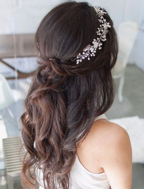 the back of a woman's head wearing a hair comb