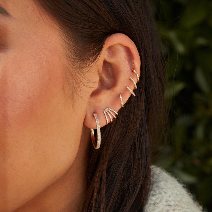 The Gold Mini Huggie Earring is one of our very best sellers—and for good reason. This dainty style crafted from 14k gold is perfect for everyday wear and looks just as good in the lobe as it does higher up the ear. In other words, you can't go wrong with this winner. 14k White Gold Ear Climbers, 14k Rose Gold Cartilage Earrings With Matching Set, Elegant Hypoallergenic Huggie Ear Climbers, Single Rose Gold Ear Climber In 14k Gold, Rose Gold Single Ear Climber In 14k Gold, Minimalist 14k Rose Gold Ear Climbers, Minimalist Rose Gold Sterling Silver Ear Climbers, Everyday Rose Gold Sterling Silver Ear Climbers, Minimalist Rose Gold Pierced Ear Climbers