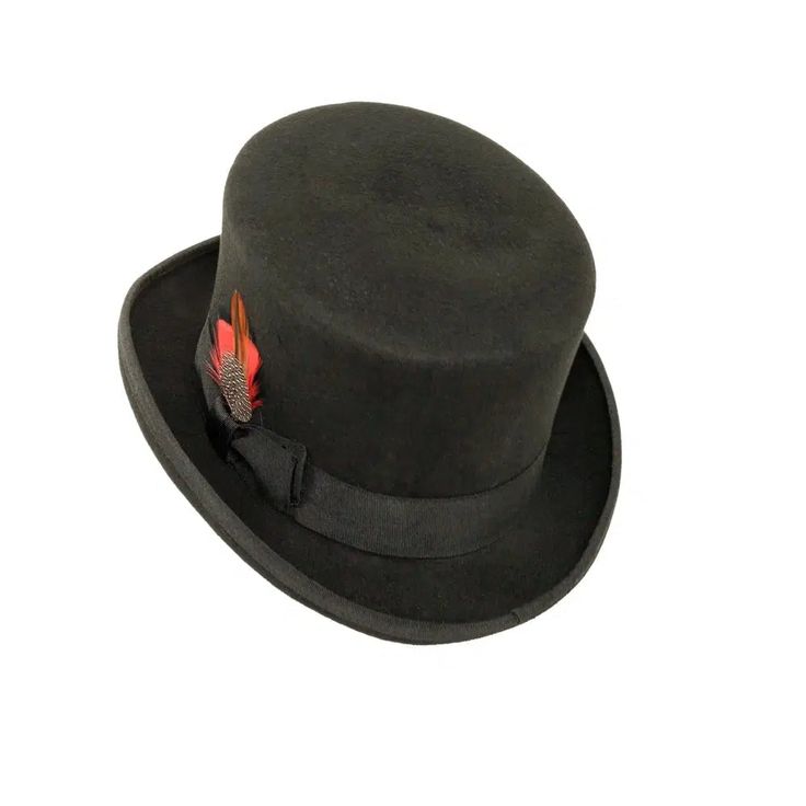 For the dapper gentleman, the Majestic | Men's Top Hat is a timeless classic that lends an air of sophistication and refinement. Crafted from sumptuous wool, this top hat exudes luxury, available in black and white carriage hat band and delicate ribbon and feather accents. Its exquisite craftsmanship will make you look and feel like a true gentleman. This sweatband is sewn in but don't sweat it. It comes with Free size adjustment pads to size it down. A $10 dollar value. White Carriage, American Hat Makers, Kinds Of Hats, 10 Dollar, True Gentleman, Wool Top, Dapper Gentleman, Head Shapes, Felt Hat