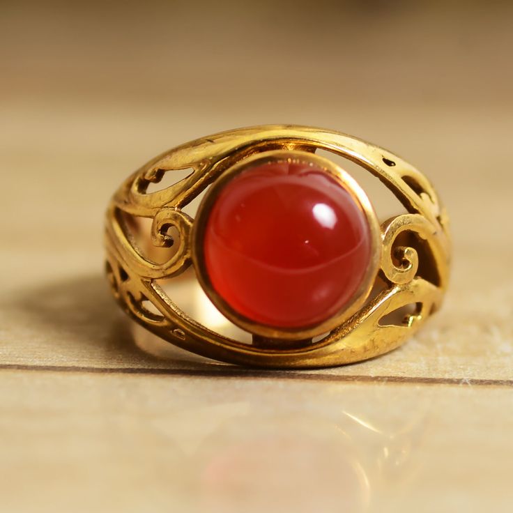 Carnelian Ring, gemstone ring, statement ring, handmade ring, brass ring, unique ring, gift for her, anniversary ring, wedding ring, promise Gemstone carnelian Jewelery Category:- Handmade Ring Metal:-Brass -- T H E * Q U A L I T Y We buy raw gemstones directly from miners and then get them cut and polished at our workshop , Therefore saving some bucks (additional added fees and markups) avoiding a middle man and making sure of the authenticity of the gems. And we use top quality materials that Heirloom Brass Rings For Anniversary, Yellow Gold Brass Moonstone Ring For Gift, Unique Brass Jewelry For Anniversary, Distinctive Brass Jewelry For Anniversary, Elegant Gold Moonstone Ring In Brass, Brass Gemstone Ring Jewelry, Antique Brass Wedding Ring, Gold Brass Crystal Ring For Gifting, Vintage Gold Enamel Ring With Gemstone