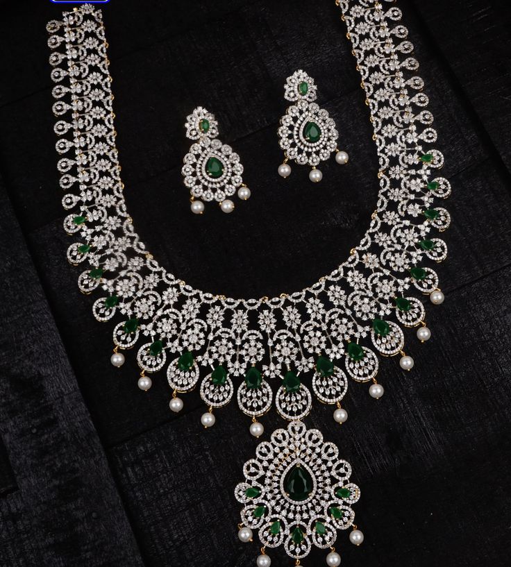 **Exquisite Diamond Replica Haram Necklace Set** Transform your look with our stunning Diamond Replica Haram Necklace Set, designed to bring unmatched elegance to your special occasions. This beautifully crafted jewelry set is perfect for brides and anyone looking to add a touch of luxury to their ensemble. **Product Details - **Materials High-quality diamond replicas that offer brilliance and durability. - **Design Intricate haram necklace with matching earrings, combining traditional craftsman Luxury Hand Set Bridal Sets, Luxury Hand Set Bridal Sets For Wedding, Luxury Wedding Bridal Sets, Diamond White Hand Set Bridal Sets For Wedding, Lab Grown Diamond Cut Jewelry For Wedding, Wedding Jewelry With Diamond Cut Lab Grown Diamonds, White Gold Lab Grown Diamond Necklace For Wedding, Wedding Jewelry With Lab Grown Diamond Cut, White Gold Lab-grown Diamond Necklace For Wedding