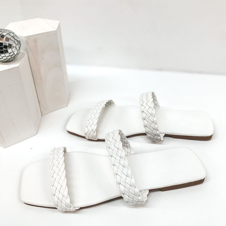 These adorable sandals are perfect for the upcoming seasons! They include two braided straps, square toe, and so much style! Pair these with jeans or a dress and you'll be set! These shoes fit true to size. SKU: #Flashy-03-White