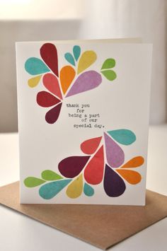 a card with colorful leaves on it