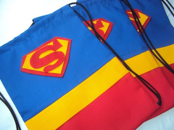 two bags with superman logos on them