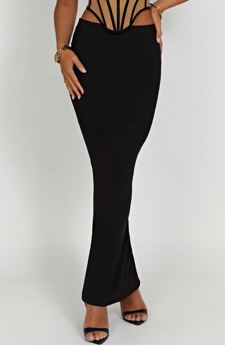 Astrid is our brand new figure skimming maxi skirt. cut from premium double layered jersey with stretch. With a flattering high rise fit. the design is made with your curves in mind and looks amazing paired with the Estella corset. Colour: Black. Premium double layered jersey. Super stretchy. Figure hugging fit. High waist. Maxi length. Model is a Size XS and is wearing an XS. Homecoming Dresses Corset, White Dress Spring, Long Sleeve Homecoming Dresses, Homecoming Dresses Long, Maxi Dress Sale, Sparkle Dress, Dresses By Length, Ruffled Maxi Dress, Formal Dresses Prom