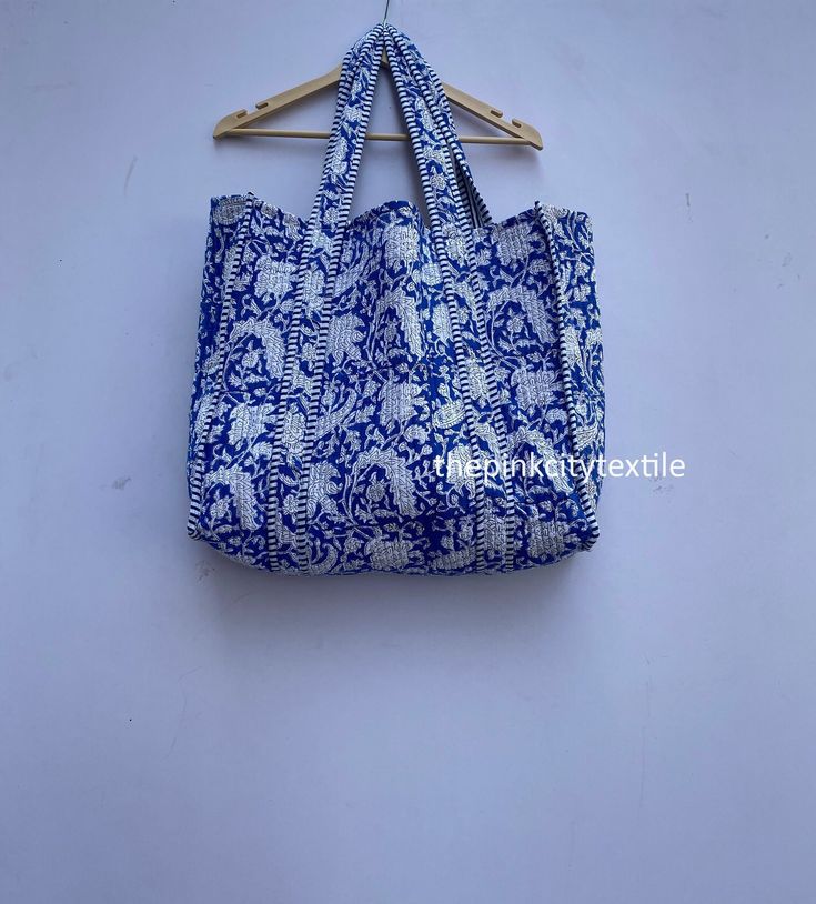 cotton print Bag The Indian Hand Block Printed Cotton Quilted Women's Handbags from Rajasthan India. This Handbag is completely Indian Printed on good quality cotton. Cotton quilted Jhola Bag made by Indian Artisans, this cotton quilted shopping bag is totally unique and multi purpose. Use this for your grocery or as a travel bag. Perfect to suit all. Item :- Cotton Handbag Material: Quilted Cotton Fabric Color - rainbow Pattern : Block Print Style: Tote Bag, Handle Bag, Shoulder Bag Size in Inc Cotton Shoulder Beach Bag For Travel, Rectangular Cotton Beach Bag For Everyday Use, Large Capacity Cotton Tote Beach Bag, Summer Reversible Cotton Shoulder Bag, Eco-friendly Cotton Shoulder Beach Bag, Cotton Shoulder Beach Bag For Everyday Use, Reversible Cotton Shoulder Bag For The Beach, Rectangular Cotton Canvas Bag For Vacation, Cotton Canvas Shoulder Bag For Beach