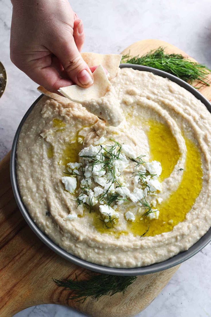 This Creamy White Bean Hummus Will Make You Ditch Chickpeas White Bean Feta Dip, White Bean Hummus With Tahini, Hummus Recipe With Tahini, Greek Hummus Dip, Recipe With Tahini, White Bean Hummus Recipe, Bean Hummus Recipe, Mediterranean Appetizers, White Bean Hummus