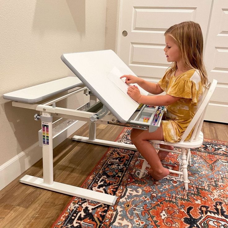 Our kid's adjustable study desk offers sit-stand workstation ergonomics for your kids every day. Using our intuitive locking rotary knobs, you or your kids can easily adjust the height from 21.3" to 30". Our children's adjustable table will grow in height along with your little loved ones and will be ready to adjust for sit or stand work. The drawer for storage underneath the surface of the ensures your kid's school supplies will never go missing again! They'll be able to easily find the right p Desk For Kids, Sit Stand Workstation, Childrens Desk, Height Adjustable Desk, Drawing Desk, Kids School Supplies, Kids Studio, Portable Desk, Stand Up Desk