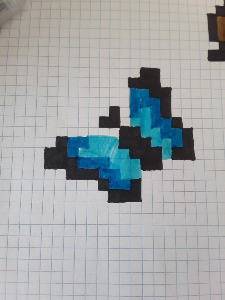 an image of some pixel art on a piece of paper that looks like something out of space