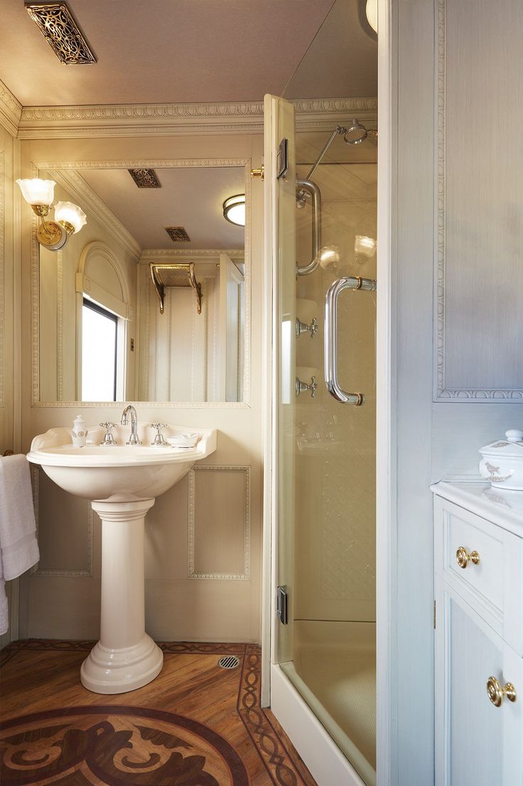 the bathroom is clean and ready to be used as a shower stall or sink area