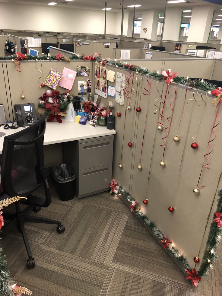 an office cubicle decorated with christmas decorations