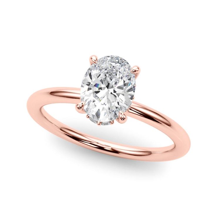 a rose gold engagement ring with an oval cut diamond