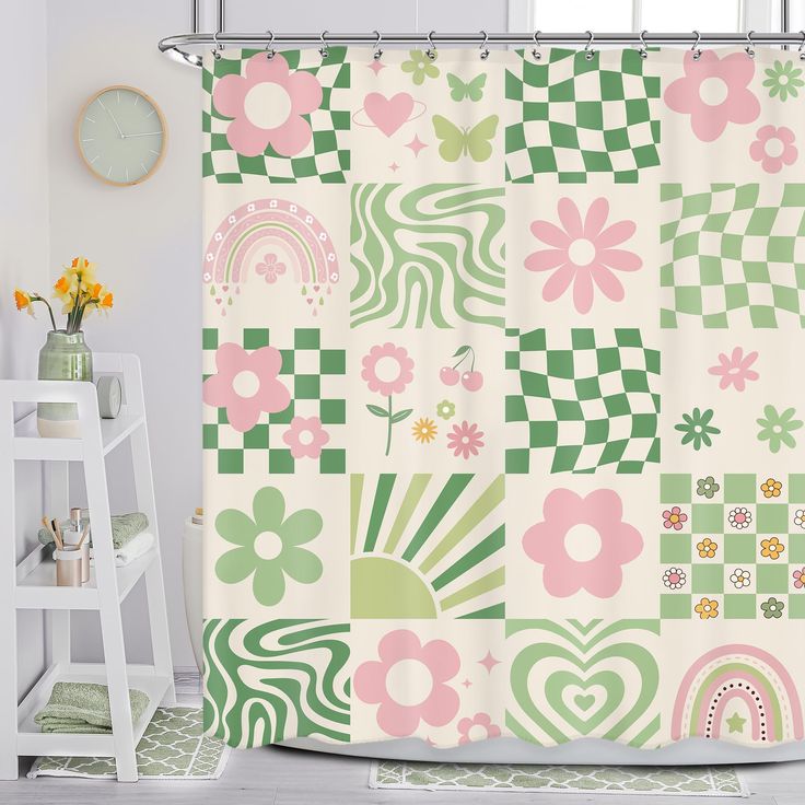 the shower curtain is decorated with flowers, hearts, and other things in pastel colors