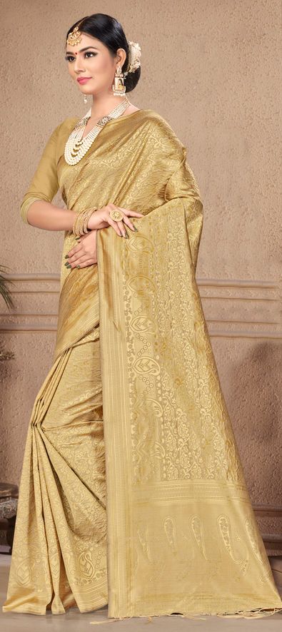 Cost Includes Saree,Unstitched BlouseFall & Edging Work Description: Gold color Saree in Banarasi Silk, Silk fabric with Weaving work Fabric: Banarasi Silk, Silk Work: Weaving Color Family: Gold Style: South Occasion: Traditional Saree Dimension: 530 Cm x 110 Cm ( L x W) Blouse Length: 80 Cm Approx Washing Instruction: Dry Wash Luxury Gold Banarasi Silk Churidar, Gold Color Saree, Red Flower Girl Dresses, Blouse Pictures, Reception Lehenga, Celebrity Gowns, Traditional Saree, Designer Sarees Online, Net Saree