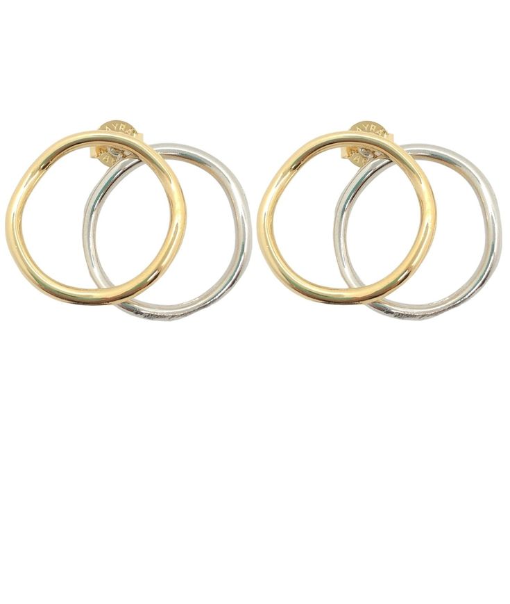 These Circles Earrings are the perfect blend of luxury and versatility. Made with 18k gold and white rhodium plating, they can be worn together or separately to match any outfit. Versatile and stylish, these earrings are a must-have for any fashion-forward individual. Trendy Formal Earrings With Plating, Trendy Yellow Gold Plated Earrings, Trendy Yellow Gold Earrings For Formal Occasions, Chic Formal Earrings With Plating, Plated Metal Round Earrings, Metal Plated Round Earrings, Modern Silver Plated Earrings, Round Metal Plated Earrings, Trendy Round Clip-on Earrings For Formal Occasions