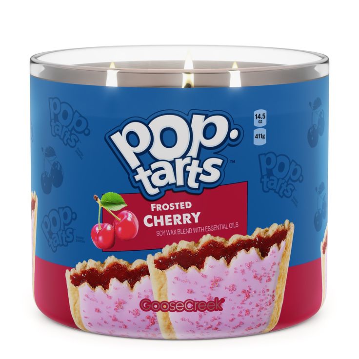 a close up of a can of food with cherries on the top and frosting