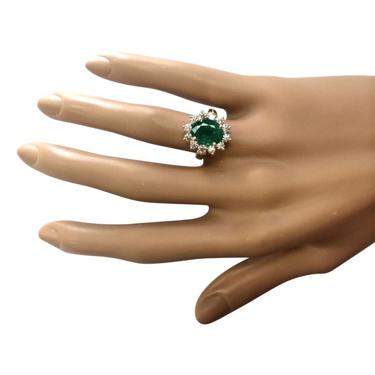 Stamped: 14K Yellow Gold Total Ring Weight: 5.2 Grams Ring Length: N/ARing Width: N/A Gemstone Weight: Total Natural Emerald Weight is 3.33 Carat (Measures: 10.55x8.50 mm) Color: GreenDiamond Weight: Total Natural Diamond Weight is 1.00 Carat Quantity:12 Color: F-G, Clarity: VS2-SI1 Face Measures: 16.65x14.50 mm Sku: [703872W] Dazzling Green Rings For Formal Occasions, Green Dazzling Rings For Formal Occasions, Formal Green Dazzling Rings, Formal Cluster Emerald Ring With Prong Setting, Formal Cluster Emerald Ring With Center Stone, Formal May Birthstone Diamond Ring With Center Stone, Exquisite Green Rings For Formal Occasions, Cluster Ring With Center Stone In Emerald, Formal Green Cubic Zirconia Halo Ring