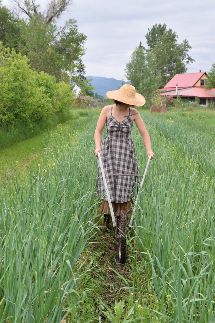 Dresses are sometimes cooler to farm in during summer months. Try our Grace Cotton Sundress-with pockets, of course! Wear it over a long sleeve for cooler temps too! Greenhouse Worker Outfit, Farm Style Clothing, Farm Wife Outfit, Farm Dress Outfit, Womens Farm Work Clothes, Farm Fashion Women, Gardening Outfits For Women, Womens Gardening Clothes, Gardening Attire