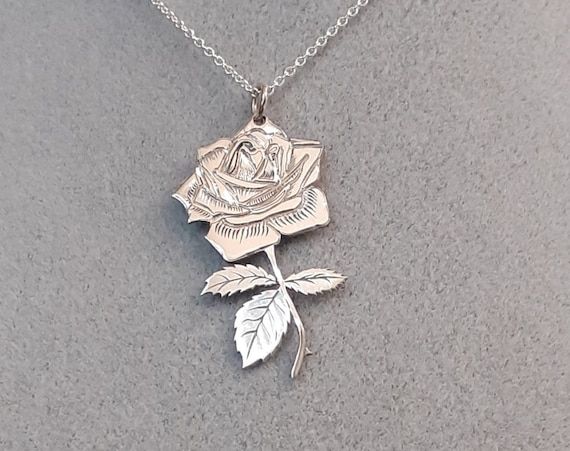 Hey, I found this really awesome Etsy listing at https://www.etsy.com/listing/767406959/silver-rose-pendant-necklace Rose-colored Sterling Silver Necklace For Anniversary, Rose Sterling Silver Necklace For Anniversary, Silver Rose Design Necklace For Anniversary, Silver Spiritual Necklace For Anniversary, Sterling Silver Birth Flower Jewelry For Anniversary, Rose-colored Nickel-free Jewelry For Gifts, Rose Nickel-free Jewelry For Gift, Rose Nickel Free Jewelry For Gift, Silver Round Pendant With Rose Design