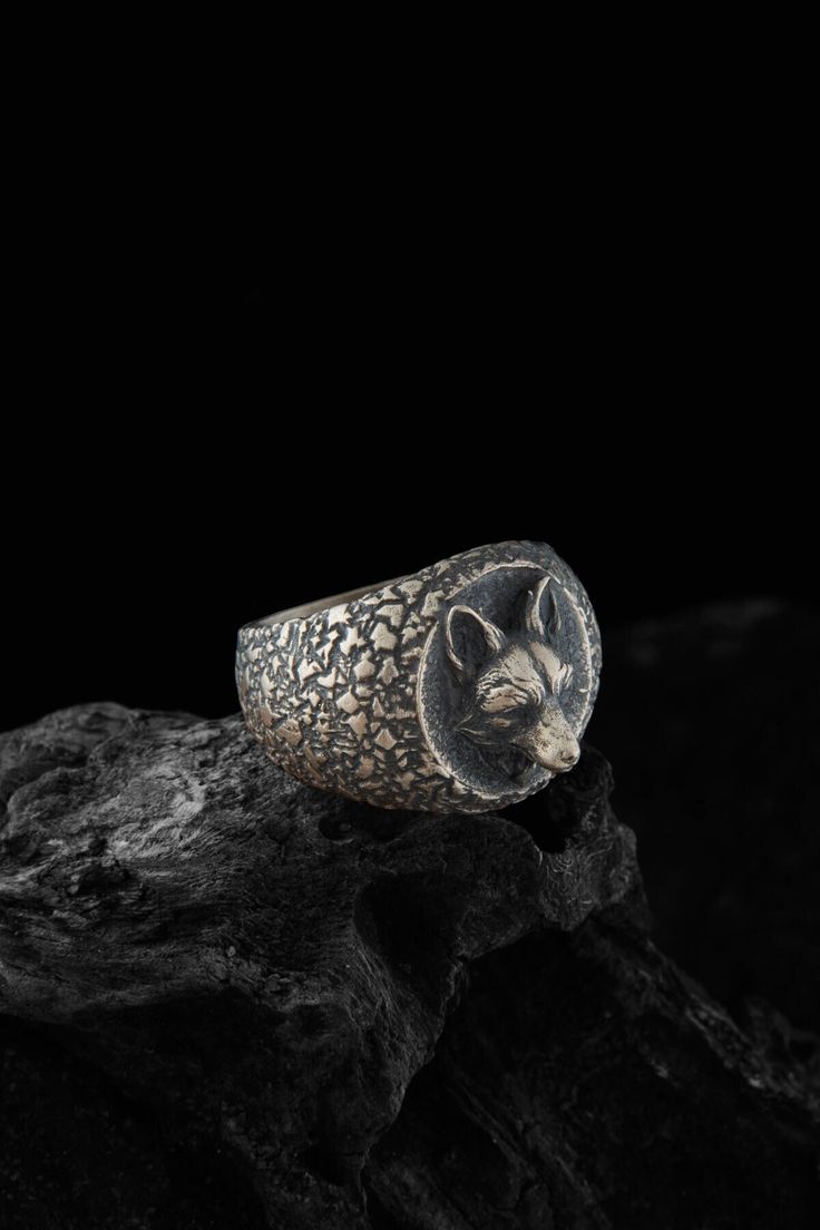 Large Fox Signet ring has been created by talented craftmens as handmade. We design to compliment your style! We believe there is something special for everyone and for every occasion, whether you're shopping for yourself or looking for a gift. Our wide selection of jewelry leaves no doubt or question marks regarding if one can find anything for themselves. Item Details Gender : Male / Female / Unisex Material : 925K Sterling Silver Total weight : 10.00 - 12.00 Gr. (US 11 Size) All our products Hand Forged Symbolic Rings For Collectors, Symbolic Hand Forged Rings For Collectors, Artisan Engraved Rings For Promise, Symbolic Hand-forged Engraved Ring As A Gift, Symbolic Hand Forged Engraved Ring As Gift, Symbolic Hand Forged Engraved Ring For Gift, Handmade Sterling Silver Signet Ring With Open Design, Hand Forged Open Signet Ring Gift, Handmade Sterling Silver Signet Ring With Open Shape