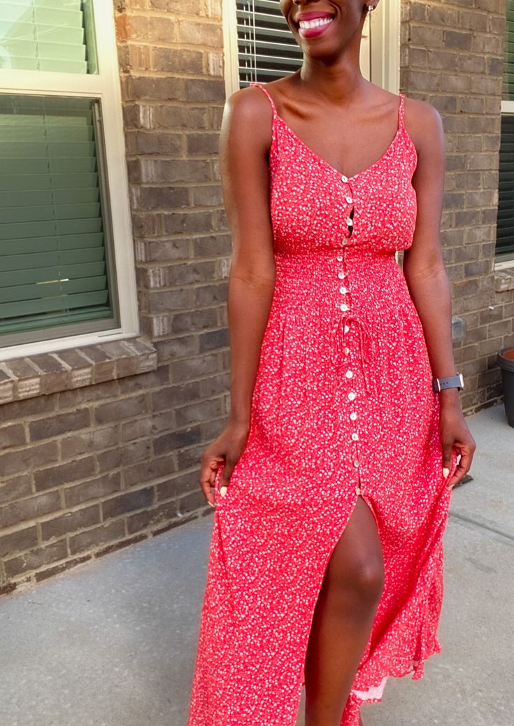 Spring is here and floral sundresses are all the rage! This beautiful red floral midi dress is no exception. It is light and flowing. The perfect outfit for a summer or spring day! Toss on a pair on sneakers, cute wedges, or comfy flip flops and you’re ready to go in this dress! This dress features a front button closure, is mid calf length and has adjustable straps. It fits true to size. Model is 5’4 and is wearing a size Small. 100% rayon Midi dress Fit and flare Adjustable spaghetti strap Fro Summer Midi Sundress, Midi Sundress For Summer Brunch, Trendy Spring Midi Sundress, Trendy Midi Sundress For Spring, Spring Midi Sundress For Brunch, Trendy Floral Print Maxi Dress For Day Out, Trendy Spring Maxi Dress, Trendy Floral Print Sundress For Beach Season, Feminine Maxi Sundress For Summer