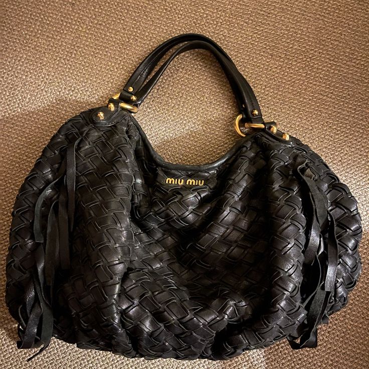 Purchased In Bergdorf Goodman Circa 2008/2009 (Can’t Remember Exact Year But Definitely Around There) 100% Authentic. Made In Italy. Literally The Sturdiest Bag I’ve Ever Owned The Bigger Bag And Fridge Always Comes Back In Style. Hold Everything. Excellent Condition. Easily Worn Over Shoulder. Bag Measurements And Details; Length: 19 In Width: 1 In Height: 15 In Drop: 5 In Gold Toned Hardware Miu Miu Hobo Bag, Designer Bags With Top Handle And Braided Handles, Designer Bags With Braided Handles And Top Handle, Luxury Handheld Satchel With Braided Handles, Designer Hobo Shoulder Bag With Leather Handles, Designer Hobo Bag With Leather Handles, Designer Hobo Bag With Detachable Strap For Errands, Designer Crossbody Hobo Bag With Leather Handles, Designer Hobo Bag With Leather Handles For Evening