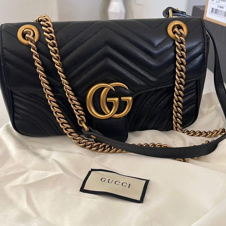 Gucci Gg Marmont Small Shoulder Bag, Black Leather, Only Been Carried Handful Of Times. I Don’t Have The Box For It Only The Duster. No Scratches. 100% Authentic Elegant Black Shoulder Bag With Gold-tone Logo, Classic Gucci Bags With Gold-tone Logo Plaque, Gold Gucci Bag With Original Box, Gucci Rectangular Bag With Gold-tone Logo Plaque, Gucci Rectangular Shoulder Bag With Gold-tone Logo, Gucci Gold Bag With Gold-tone Logo Plaque, Elegant Gucci Bag With Gold-tone Logo Plaque, Luxury Gucci Bag With Gold-tone Logo Plaque, Luxury Gucci Shoulder Bag With Original Box