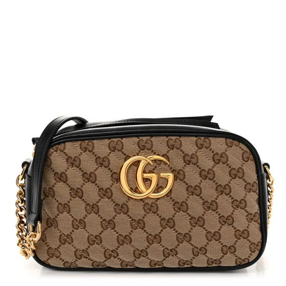 This is an authentic GUCCI Monogram Matelasse Diagonal Small GG Marmont Chain Shoulder Bag in Beige and Black. This chic shoulder bag is crafted of traditional Gucci GG monogram canvas with a beautifully stitched diagonal pattern. It features black leather trim, a polished gold chain link and black leather shoulder strap, and a polished gold Gucci GG logo on the front. The top zipper and tassel opens to a beige microfiberinterior with a patch pocket. Gucci Rectangular Shoulder Bag With Gold-tone Logo, Gucci Gold Bag With Gold-tone Logo Plaque, Gucci Rectangular Bag With Gold-tone Logo Plaque, Gucci Rectangular Gold Bag, Gucci Gold Rectangular Bag, Gold Rectangular Gucci Bag, Rectangular Gold Gucci Bag, Gucci Gold Monogram Canvas Bag, Gucci Marmont Bag