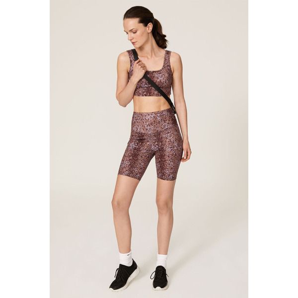 Purple printed nylon (88% Nylon, 12% Spandex). Top. Sleeveless. Square neckline. Fully lined. 2.5" from shoulder to hemline. Imported. Printed Sports Bra, Spandex Top, Rent The Runway, Closet Designs, Top Sleeveless, Bike Shorts, Cheetah Print, Square Neckline, Bra Tops