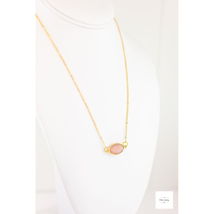 Experience the stunning beauty of our pretty Pink Chalcedony Necklace! This exquisite piece will captivate the senses with its lustrous pink hues and delicate gold chain. Add a touch of timeless beauty and elegance to any outfit with this must-have accessory. The combination of dusty rose pink chalcedony and bright gold chain create a romantic charm that is destined to become a jewelry box staple. The exquisite marquise-shaped chalcedony gemstone, delicately sits in a vermeil bezel that shimmers