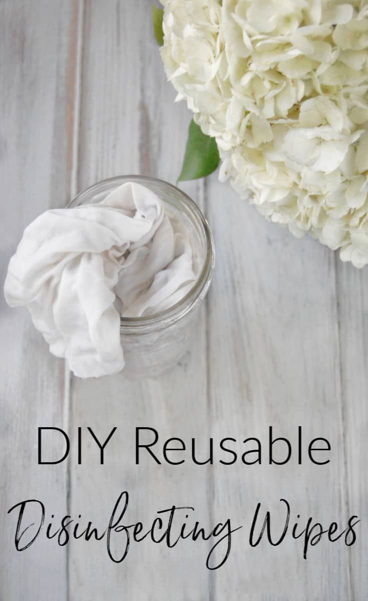 diy reusable disinfecting wipes in a jar with flowers