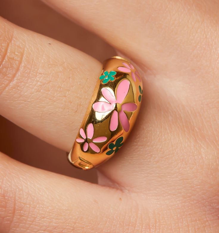 Meet our stunning Pink Flower Ring. This adorable piece will brighten up any look with a lovely splash of pink, while the green adds a fresh little twist – it's a stylish and heartwarming statement jewelry you won't want to take off!

Available also in 14K Solid Gold. 
Please note that 14K bespoke items are final sale and production time is around 2 weeks.
Dome Height: 10mm Pink Flower Ring, Zodiac Necklaces, Gold Piece, Pink Ring, Flower Bracelet, Flower Ring, Everyday Jewelry, Huggies Earrings, Pink Flower