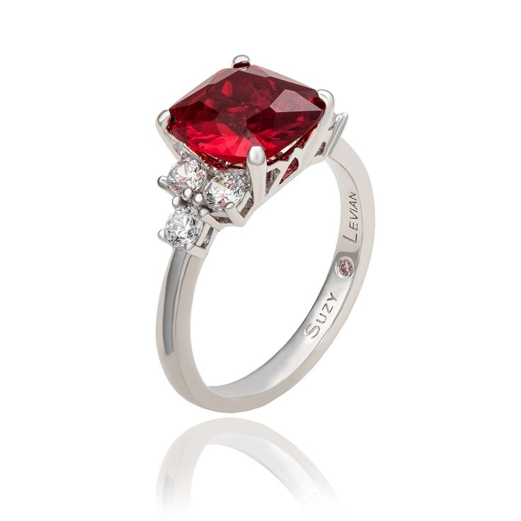 From the day he bends down on one knee through your 50th wedding anniversary and beyond, the sparkle in this gemstone ring will rival the sparkle in his eyes when he looks at you. Made of 925 sterling silver, this fabulous ring features a cushion cut red cubic zirconia center stone, sided by three white cubic zirconia's prong set on each side. If you are in the market for an affordable engagement ring that blends traditional with a dash of originality then this one is perfect for you. Every sing Down On One Knee, Cubic Zirconia Engagement Rings, Engagement Rings Affordable, 50th Wedding Anniversary, 50th Wedding, Cushion Cut, Gemstone Ring, Earring Necklace, Prong Setting