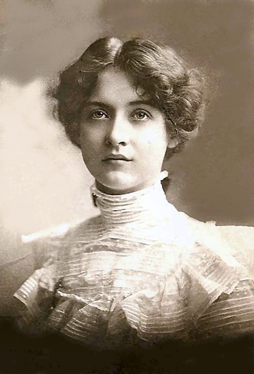 an old black and white photo of a woman