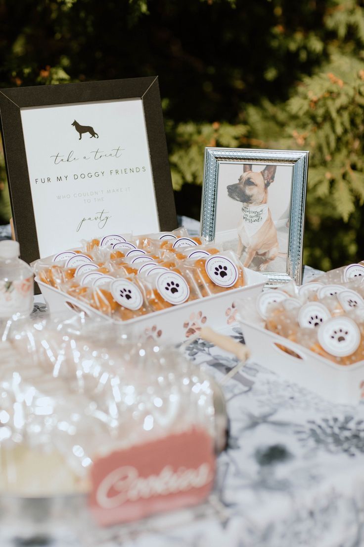 a table topped with lots of treats and candies